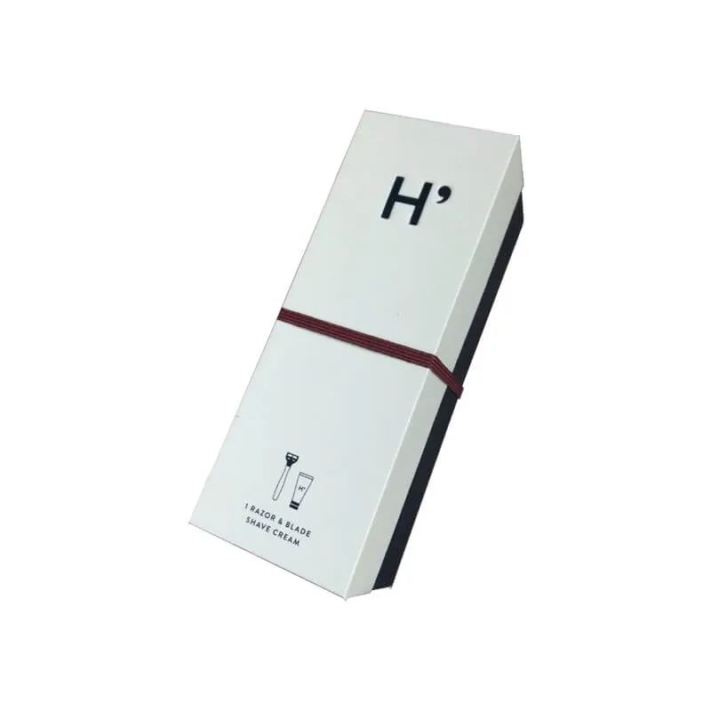 Embossed logo rigid box for a shave