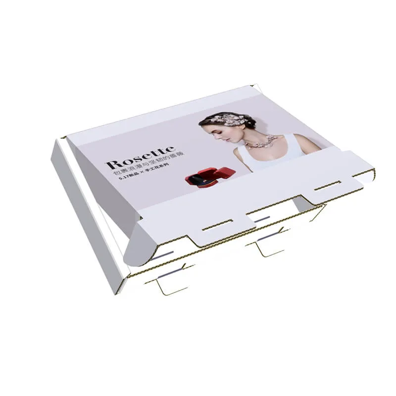 Corrugated folding mailer boxes
